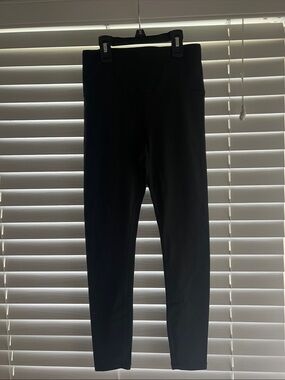 Athleta Elation Lasercut Tight in Black Size XS